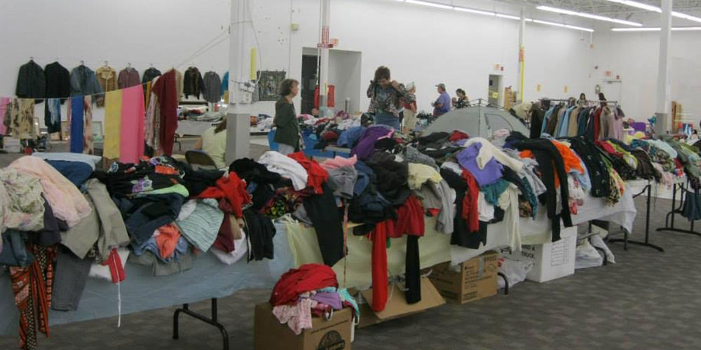 image of interior warehouse sale with items organized on tables