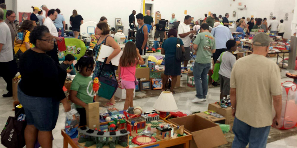 image of crowd attending warehouse sale